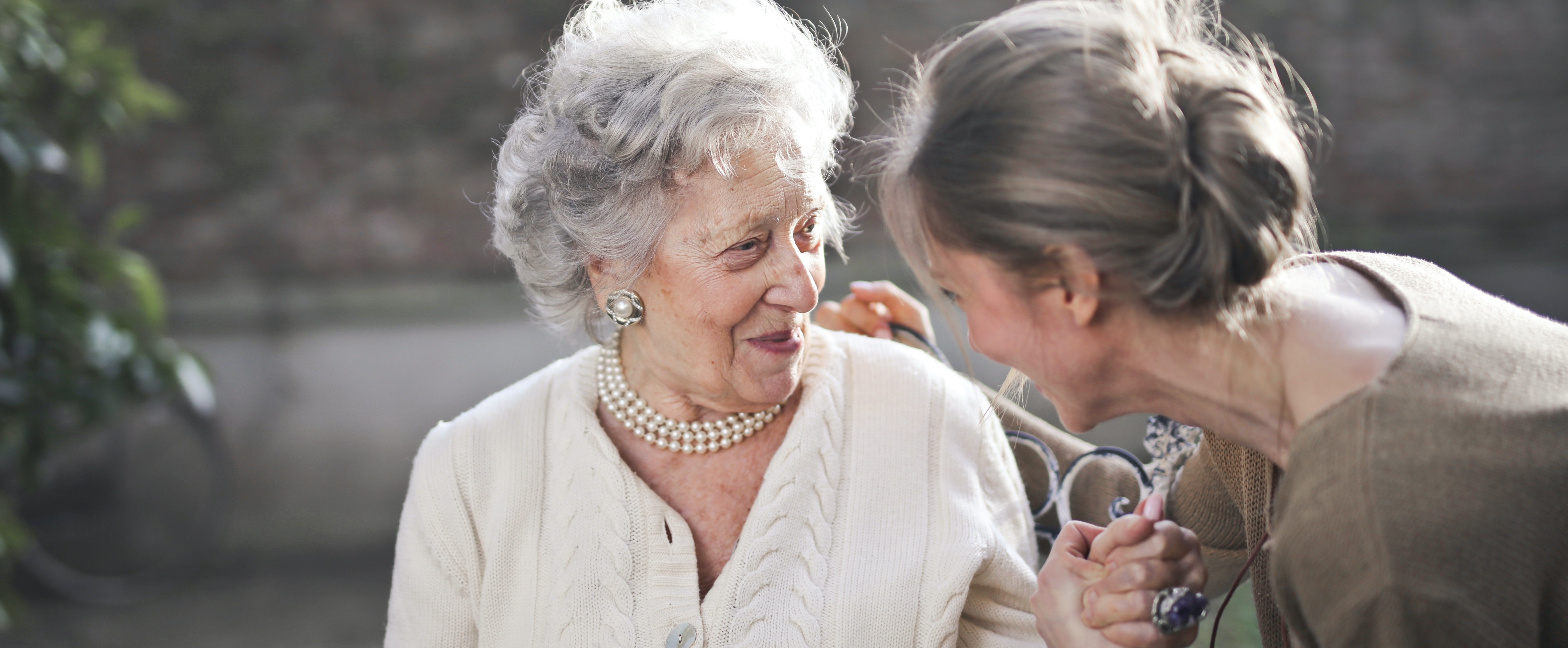 An image of two women smiling