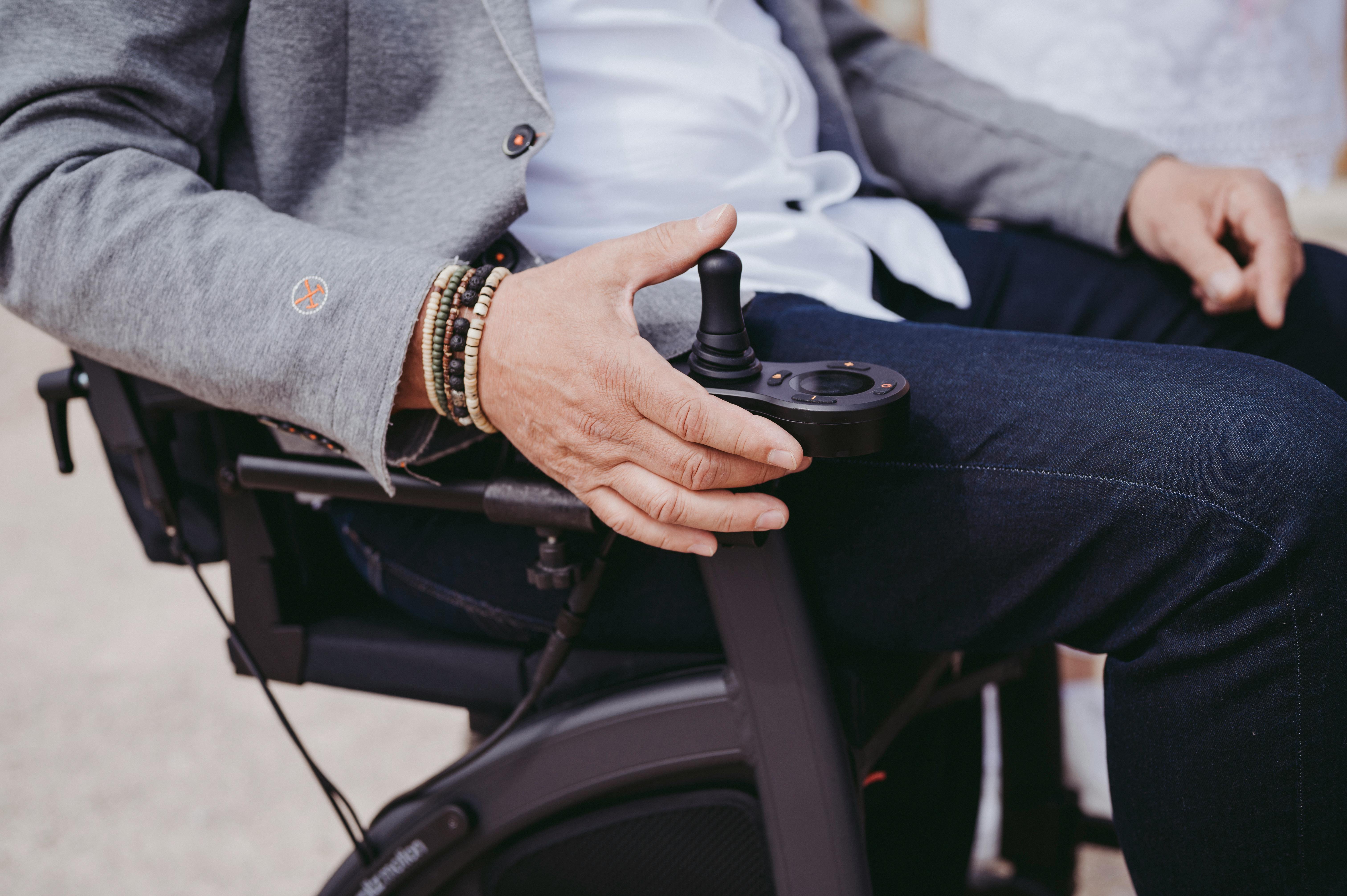 a close up of a man in a wheelchair